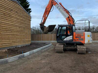 exterior barn with digger