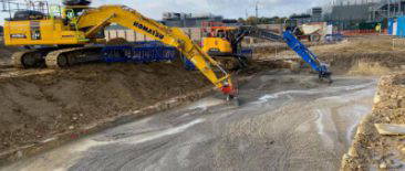 yelllow and blue digger working in farnborough