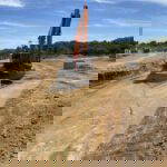 Preformed manholes going into road 1 excavated with 3D machine control